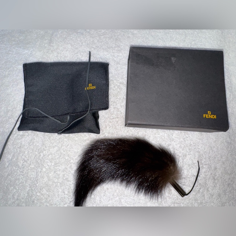Fendi Brown and Black Fur Charm with box and dust bag.